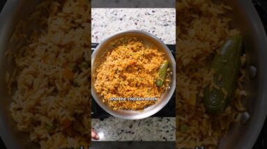 Perfect Mexican Rice but make it a little more browned with chicken stock, buillion and veggies